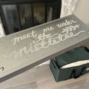 'Meet Me Under the Mistletoe' Sign